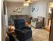 Inviting living room with hardwood floors, neutral paint, and comfortable seating arrangement, perfect for relaxation at 1811 Ridge S Rd, Largo, FL 33778