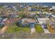 Aerial view of the home showcasing the in-ground pool, water access, and community at 2027 Montana Ne Ave, St Petersburg, FL 33703