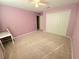 Cozy bedroom featuring a carpeted floor and a closet at 2111 Roanoke Springs Dr, Ruskin, FL 33570
