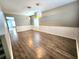 Dining room features paneled walls and two pendant lights at 2111 Roanoke Springs Dr, Ruskin, FL 33570