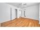 Bright bedroom featuring hardwood floors, a ceiling fan, and white walls at 2169 22Nd N Ave, St Petersburg, FL 33713