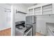 Well-lit kitchen showing updated appliances and ample storage space at 2169 22Nd N Ave, St Petersburg, FL 33713