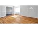 Inviting living room showcasing hardwood floors and a seamless flow to a well-lit room at 2169 22Nd N Ave, St Petersburg, FL 33713