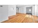 Spacious living room featuring hardwood floors and seamless transition to a laundry room at 2169 22Nd N Ave, St Petersburg, FL 33713
