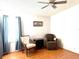 Bright bedroom featuring natural light, two chairs, and light colored walls at 222 N Saint George Cir, Apollo Beach, FL 33572