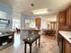 Open concept kitchen with stainless steel appliances, breakfast bar and dining room in view at 222 N Saint George Cir, Apollo Beach, FL 33572