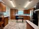 Large kitchen with wooden cabinets, stainless steel appliances, and great natural light at 222 N Saint George Cir, Apollo Beach, FL 33572
