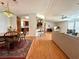 Open concept living and dining area with hardwood floors and lots of natural light at 222 N Saint George Cir, Apollo Beach, FL 33572