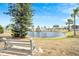 Enjoy the serene pond view from a bench in this tranquil 55+ community at 222 N Saint George Cir, Apollo Beach, FL 33572