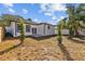 Backyard featuring a patio and trees at 4006 N 27Th St, Tampa, FL 33610