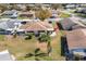 Aerial view of a home featuring patio and landscaping at 410 Faraday Trl # A, Sun City Center, FL 33573