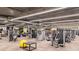 A community gym with several weight machines and stationary equipment at 410 Faraday Trl # A, Sun City Center, FL 33573