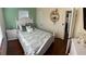 Cozy bedroom featuring a queen bed, hardwood floors, and lots of natural light at 4710 22Nd N Ave, St Petersburg, FL 33713
