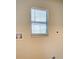 Laundry area featuring plumbing hookups and a bright window at 5043 Escalante Dr, North Port, FL 34287