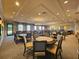 A clubhouse with seating, tables, and decor at 5062 Stone Harbor Cir, Wimauma, FL 33598