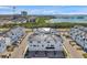 Aerial view showcases community's proximity to the water and modern architectural design at 5351 Bridge St # 81, Tampa, FL 33611
