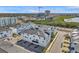 Aerial view highlights the community's location near the bay and modern design at 5351 Bridge St # 81, Tampa, FL 33611