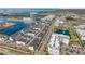 A sprawling aerial view of waterfront townhomes and scenic harbor, highlighting the community's prime coastal location at 5351 Bridge St # 81, Tampa, FL 33611