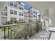 Open balcony providing community and lush landscape views at 5351 Bridge St # 81, Tampa, FL 33611