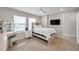 Bedroom featuring modern ceiling fan and a vanity area for added convenience at 5351 Bridge St # 81, Tampa, FL 33611