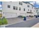Exterior view of townhomes with garages, driveways, and landscaping at 5351 Bridge St # 81, Tampa, FL 33611