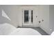 Townhouse front door with sidelight, lock, and bell at 5351 Bridge St # 81, Tampa, FL 33611