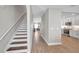 Hallway view to kitchen, stairway and living room at 5351 Bridge St # 81, Tampa, FL 33611