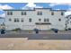 Street view showcases well-maintained townhomes, garages, and a tidy streetscape at 5351 Bridge St # 81, Tampa, FL 33611