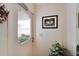 Front door with glass, security lock, and sidelight at 612 Allegheny Dr, Sun City Center, FL 33573