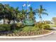 Entrance to Isla Del Sol Yacht & Country Club, showcasing lush landscaping and inviting atmosphere at 6177 Sun Blvd # 401, St Petersburg, FL 33715