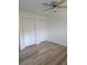 Bright bedroom with wood flooring and closet at 3949 Versailles Dr, Tampa, FL 33634