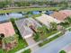 Beautiful single-story home with a large backyard and a serene water view at 5062 Stone Harbor Cir, Wimauma, FL 33598