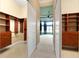 This hallway shot shows the transition from the closet to the bedroom at 5062 Stone Harbor Cir, Wimauma, FL 33598