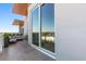 Enjoy your private balcony with comfortable seating and scenic views of the surrounding area at 1020 Sunset Point Rd # 703, Clearwater, FL 33755