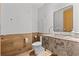 Modern bathroom with marble accent wall, contemporary fixtures, and elegant design at 1020 Sunset Point Rd # 703, Clearwater, FL 33755