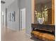 Hallway with artwork and a small bench at 1020 Sunset Point Rd # 703, Clearwater, FL 33755