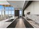 Contemporary kitchen boasting marble countertops, designer lighting, and scenic water views at 1020 Sunset Point Rd # 703, Clearwater, FL 33755