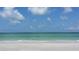 Ocean scene with calming turquoise water and cloudy skies at 11730 Gulf Blvd # 5, Treasure Island, FL 33706