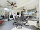 The screened in porch provides an ideal space for outdoor seating and entertaining guests at 1219 Huntington Greens Dr, Sun City Center, FL 33573