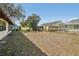 A spacious fenced backyard with ample room for outdoor activities and gatherings at 12503 Willow Tree Ave, Hudson, FL 34669