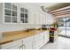 Well-organized garage with plenty of cabinet space and a functional countertop at 12503 Willow Tree Ave, Hudson, FL 34669