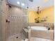 Bright bathroom featuring a walk-in shower and soaking tub with tiled surround at 1590 Gulf Blvd # 501, Clearwater Beach, FL 33767