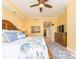 Bright bedroom with a king bed, ensuite bathroom, and ocean-themed decor at 1590 Gulf Blvd # 501, Clearwater Beach, FL 33767
