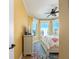 Bedroom with ocean views and ceiling fan at 1590 Gulf Blvd # 501, Clearwater Beach, FL 33767