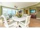 Bright dining room with ocean views and an open floor plan at 1590 Gulf Blvd # 501, Clearwater Beach, FL 33767