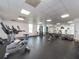Well-lit gym with exercise bikes, treadmills, weight machines and mirrored wall at 1590 Gulf Blvd # 501, Clearwater Beach, FL 33767