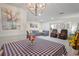 Large open-plan room combining living and dining areas, with modern furnishings and stylish accents at 1782 Coconut Dr, Venice, FL 34293