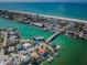 Beautiful waterfront home with a boat dock on a canal that leads out to the wide-open ocean at 199 21St Ave, St Pete Beach, FL 33706