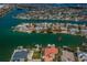 Expansive view of a canal-front neighborhood, showcasing waterfront living and boat access to open water at 199 21St Ave, St Pete Beach, FL 33706