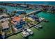 Waterfront property featuring a private dock with boat lifts and pool, set in a desirable coastal community at 199 21St Ave, St Pete Beach, FL 33706